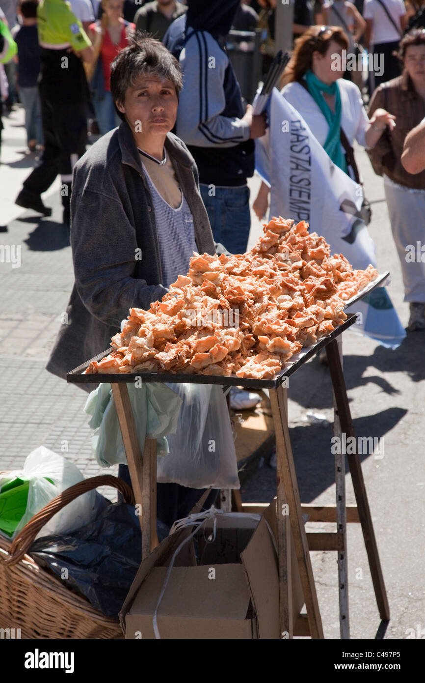 lady selling food on street stall buenos aires argentina south america C497P5