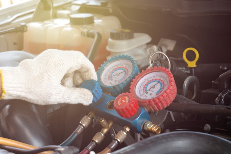 Qué tipo de gas utilizan los aires acondicionados de los autos